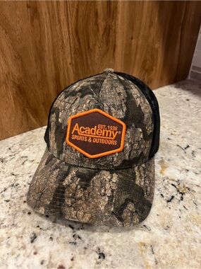 Academy Sports & Outdoors Men's Camo Trucker Hat - Black/Brown with Orange Logo